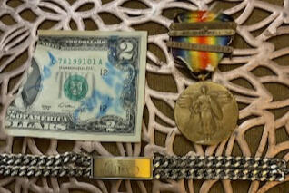 $2 bill signed by Vance Walker, bracelet of CHAD Walker & Alton D.Eastis WWI medal awarded for bravery in France